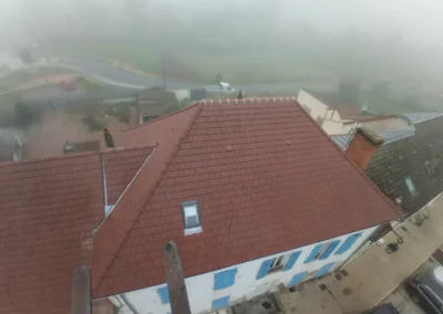 Travaux de couverture avec chêneau sur toiture
